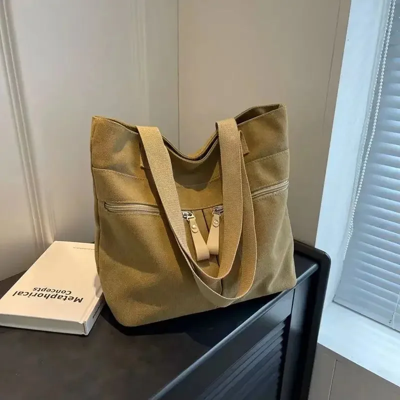 UAKISS  -  2024 New Korean Canvas Bag Women's Solid Color Versatile Large Capacity One Shoulder Handbag Personalized Commuter Tote Bag
