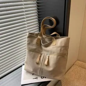 UAKISS  -  2024 New Korean Canvas Bag Women's Solid Color Versatile Large Capacity One Shoulder Handbag Personalized Commuter Tote Bag